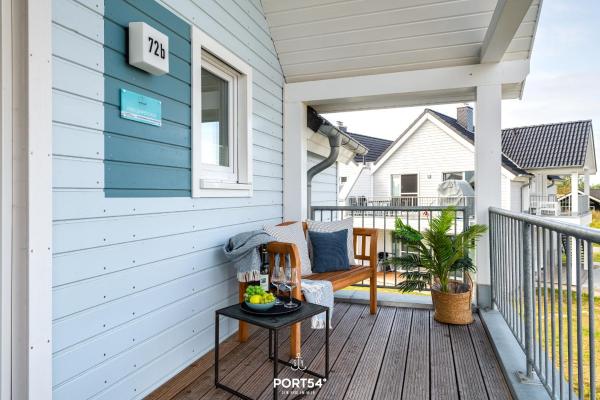 Na fotografii je vidět objekt Ferienhaus Perlenfischer Olpenitz nacházející se ve městě Olpenitz.