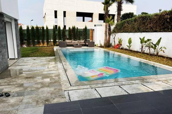 写真にはDar Hamida市にあるVilla de Luxe avec piscine privéeが写っています。