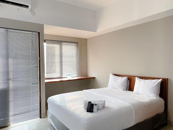 En la foto se muestra el objeto Homey and Minimalist Studio Gateway Park LRT City Jatibening Apartment By Travelio ubicado en la ciudad de Curuk Dua.