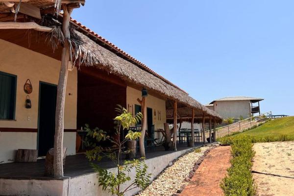 Na foto é possível ver o objeto Casa Meraki-Cajueiro da Praia-PI localizado na cidade de Cajueiro.