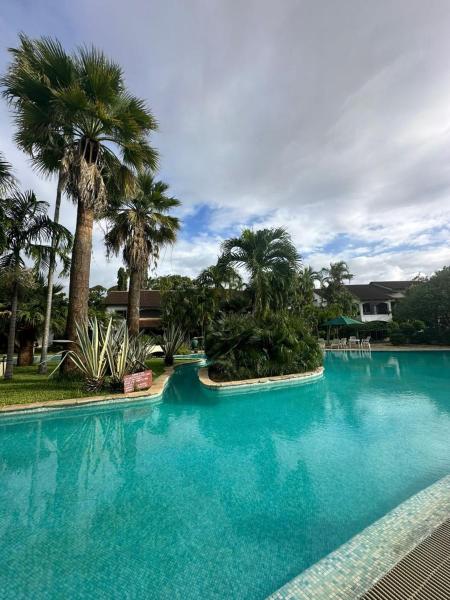 A la foto es mostra l'objecte Woburn Residences Condo by RevSerene situat a la ciutat de Malindi.