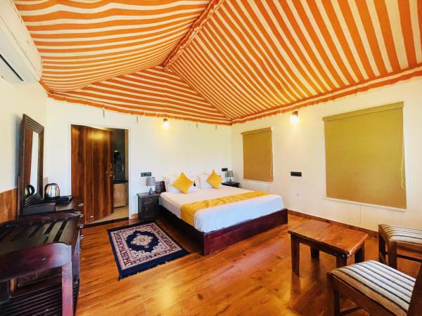 Na fotografii je vidět objekt Cattle Inn Resort - Luxury Cottages Pushkar nacházející se ve městě Puškar.