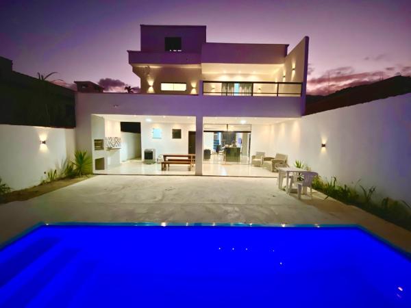 A la foto es mostra l'objecte Casa TOP com piscina e Wifi situat a la ciutat de Parati.