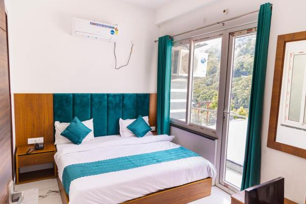 På billedet ses objektet Hotel Parth Inn beliggende i byen Rishikesh.