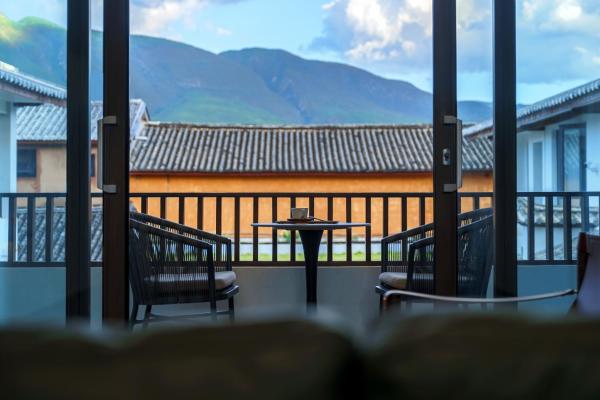 Na foto é possível ver o objeto Shaxi Ancient Town Yunxi Qiyue Hillview Guesthouse localizado na cidade de Niujie.