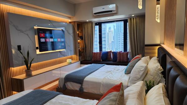 A la foto es mostra l'objecte Air Residence Makati Suite Sophisticated Living Condo 300 Mbps situat a la ciutat de Manila.