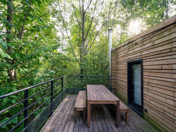 A la foto es mostra l'objecte Forest-View Cottage Stay situat a la ciutat de Antoing.