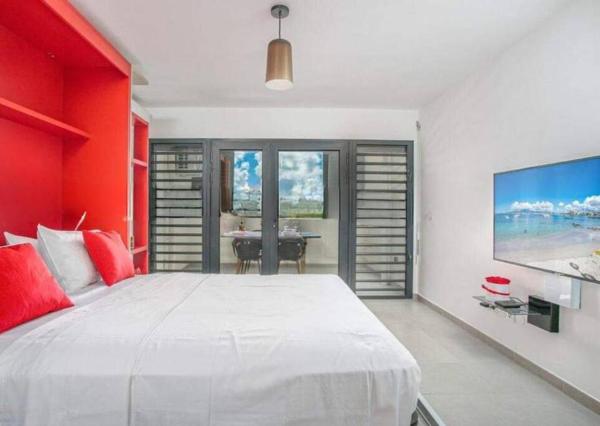A la foto es mostra l'objecte Le Studio Rosa Bay et sa magnifique vue mer à l'Étang Z'Abricot situat a la ciutat de Cité Dillon.
