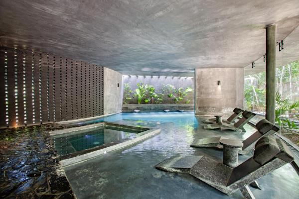 Na zdjęciu widoczny jest obiekt Encanto Luxe Jungle Apt 10min Beachhot Tubking położony w mieście Tulum.