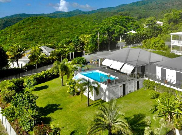 A la foto es mostra l'objecte Villa Vaïtea, piscine, vue mer, 3 chambres, secteur Ferry situat a la ciutat de Deshaies.