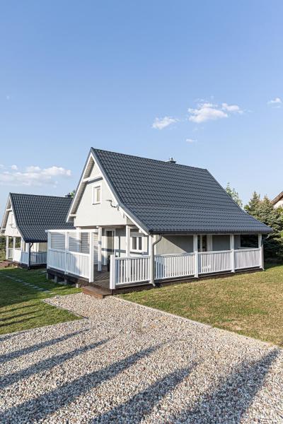 Na zdjęciu widoczny jest obiekt Mazurskie Wzgórze - domki całoroczne HOME APART położony w mieście Ostróda.