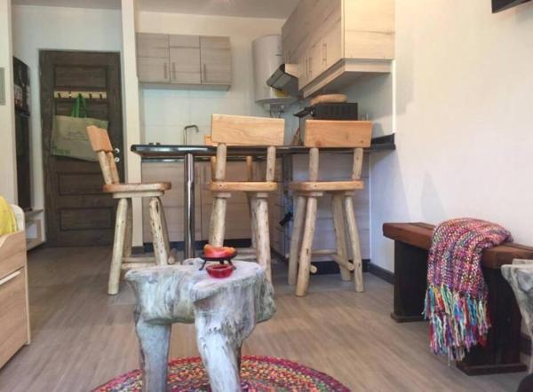 The photo shows the Dpto 4 personas 1er piso con patio Pucon located in the city of Pucón.