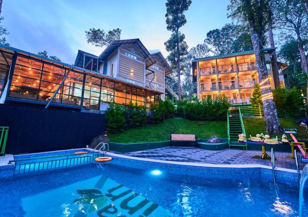 Na zdjęciu widoczny jest obiekt Areva Inn Plantation Resort Munnar with Pool by VOYE HOMES położony w mieście Munnar.