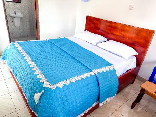 На фото показан объект Agape House Kisoro, расположенный в городе Nyarusiza.