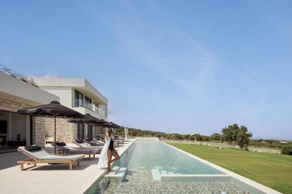 The photo shows the Gavras Exclusive Villas, with Infinity Pools, Spa Whirlpools & SeaViews, By ThinkVilla located in the city of Kapsalianá.