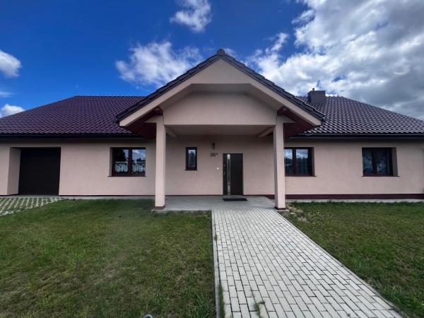 Na zdjęciu widoczny jest obiekt Unikatowy Dom 200 m2, Mielno, Pawłowo, Olsztynek położony w mieście Pacółtowo.