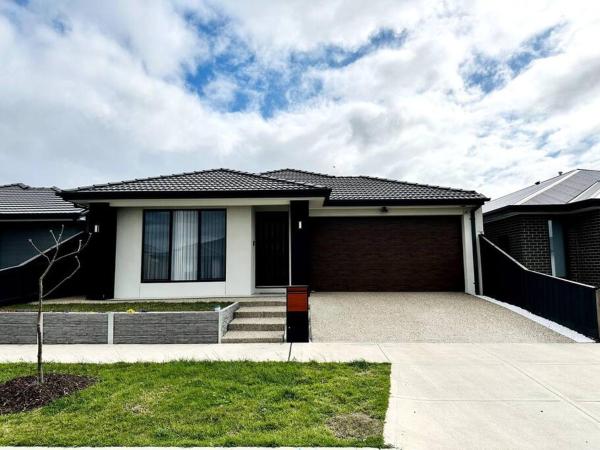 The photo shows the Family retreat-Spacious 4BR located in the city of Whittlesea.