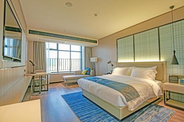 A la foto es mostra l'objecte Echarm Hotel Pubei Chengxin Commercial Plaza situat a la ciutat de Lingshan.