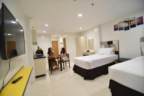 En la foto se muestra el objeto Holiday Oceanview Residences and Resort ubicado en la ciudad de Camudmud.