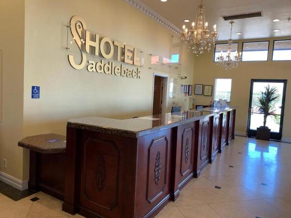 The photo shows the Hotel Saddleback located in the city of Artesia.