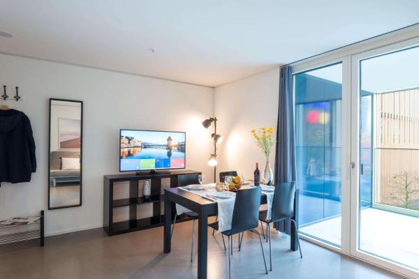 Na zdjęciu widoczny jest obiekt HITrental Allmend Comfort Apartments położony w mieście Horw.