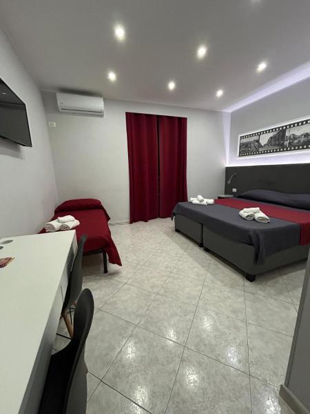 A la foto es mostra l'objecte Pacini 88 Rooms and apartment Catania Centro situat a la ciutat de Catània.