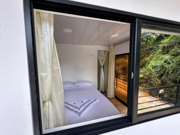 Na zdjęciu widoczny jest obiekt ECOHOTEL MONTEBELLO Norcasia Caldas położony w mieście Confines.