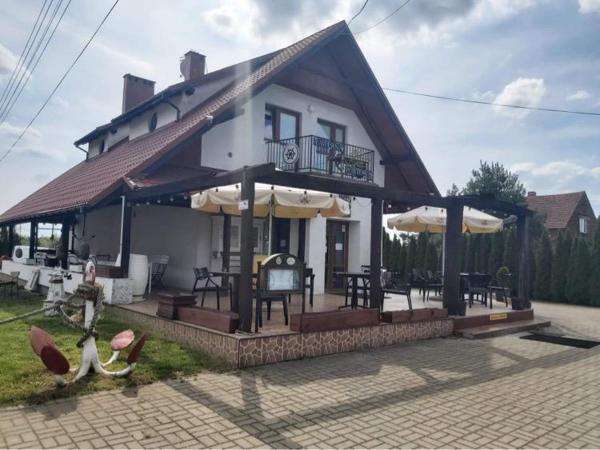 The photo shows the Tawerna Portowa located in the city of Brzeg Dolny.