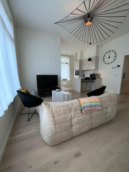 A la foto es mostra l'objecte Beautiful homey flat at the Belgian Coast situat a la ciutat de Oostende.