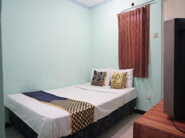 På billedet ses objektet Hotel O Amazon Homestay Syariah 2 beliggende i byen Jambatan.