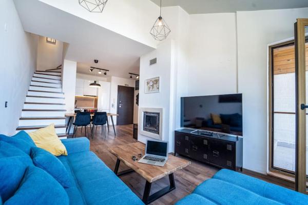 A la foto es mostra l'objecte Alpin Penthouse 2 Bedroom with Fireplace and Mountain View situat a la ciutat de Bansko.