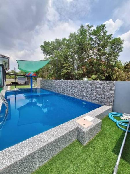 A la foto es mostra l'objecte Casa D'Villa Homestay Private Pool Melaka situat a la ciutat de Solok Belimbing.