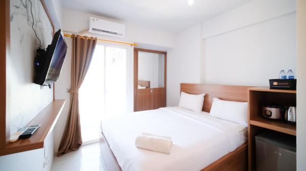 På bilden syns objektet Simple and Comfortable Studio Apartment at Suncity Residence By Travelio som ligger i staden Sidoarjo.