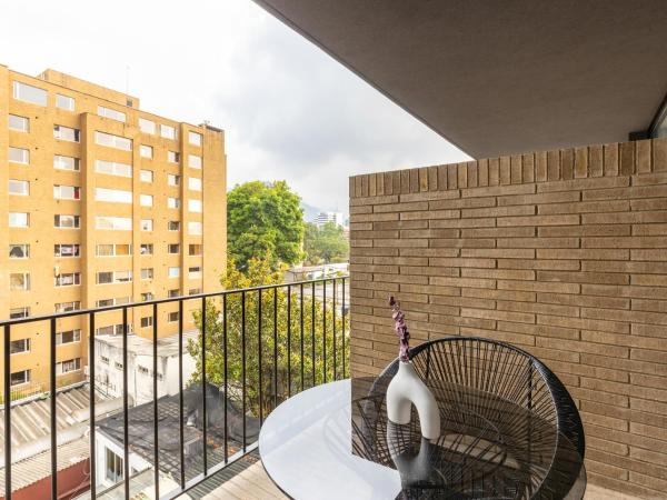 Chic Loft with Balcony in Zona T by Wynwood House photo 3
