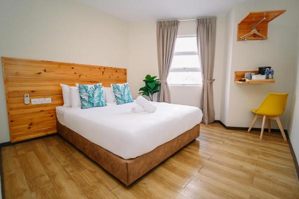 A la foto es mostra l'objecte Swing & Pillows - Apple Hotel Shah Alam situat a la ciutat de Shah Alam.