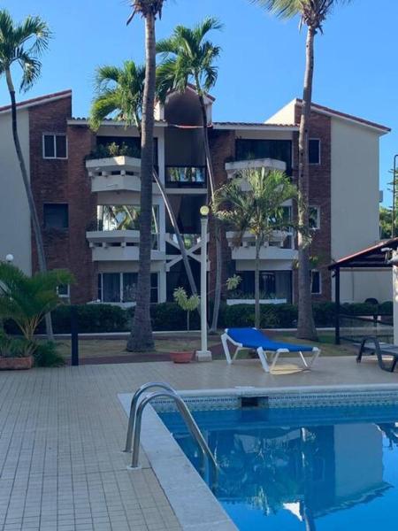 The photo shows the Jungle Oasis by the Beach located in the city of Cafemba.