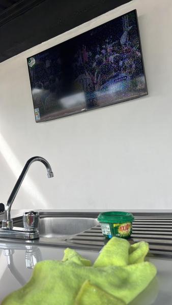 La photo montre l'objet Apartamento y piscina privado a 5 minutos del aeropuerto RVM situé dans la ville de Corozal.