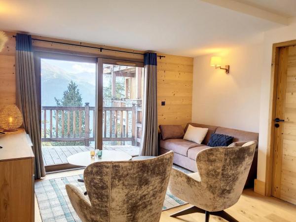 Na zdjęciu widoczny jest obiekt Résidence Diamant Des Cimes - Appartement lumineux · Billard · Spa · Vue face à la vallée MAE-7514 położony w mieście Montvalezan.