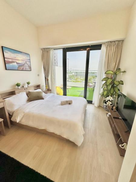 A la foto es mostra l'objecte Cozy Retreat, Relax and Explore situat a la ciutat de Dubai.