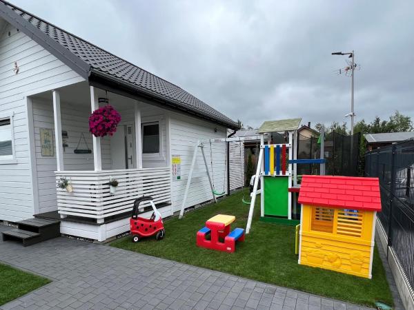Na foto é possível ver o objeto Holiday Home near Bukowo Lake & Beach localizado na cidade de Dąbki.
