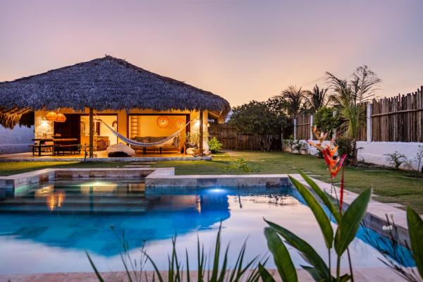 A la foto es mostra l'objecte Villa Dodô Barrinha de baixo Prea Kite point com café da manha situat a la ciutat de Aranaú.