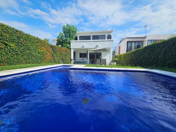 Na fotografii je vidět objekt Casa Marlica club santiago nacházející se ve městě El Naranjo.