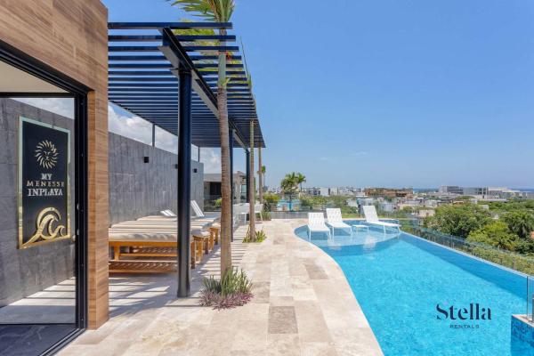 Foto 1: Chic Studio at My Menesse In Playa with Roof Pool