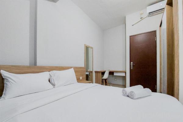 Kuvassa näkyy kohde Restful and Modern 2BR Majestic Point Serpong Apartment By Travelio, joka sijaitsee kaupungissa Anggris.