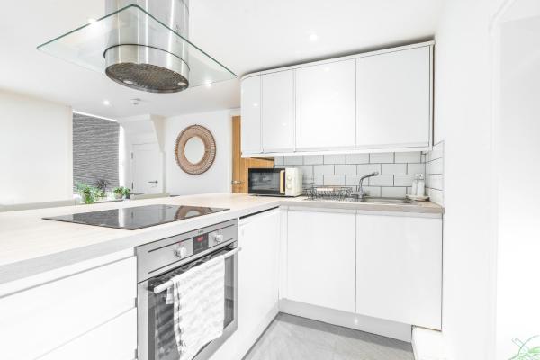 Foto 2: Charming & Chic, Cosy Beach Nest, Just 2-min walk!