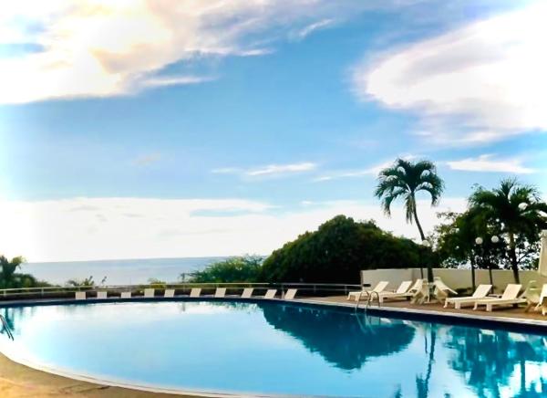 The photo shows the Apartamento Playa Aeropuerto located in the city of Playa Grande.