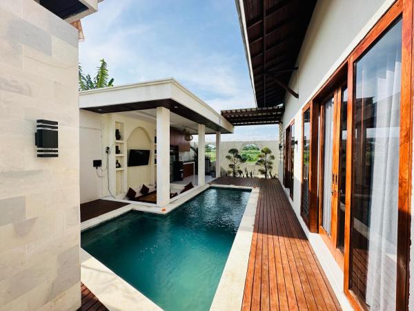 A la foto es mostra l'objecte Kelapa Villa Mambal situat a la ciutat de Mambal.