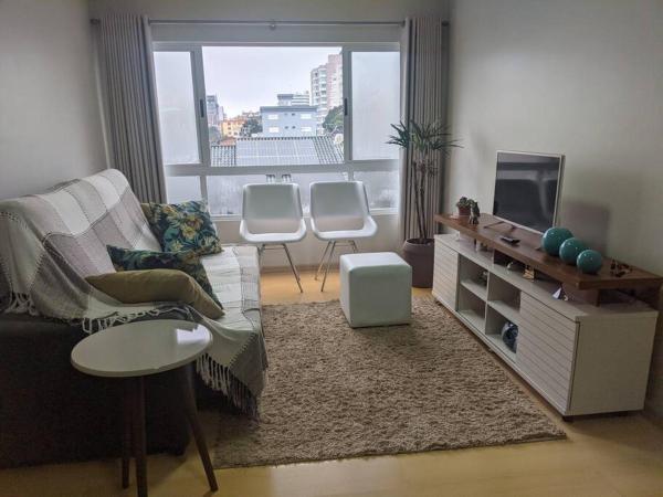 A la foto es mostra l'objecte Apartamento aconchegante no centro e com garagem situat a la ciutat de Farroupilha.