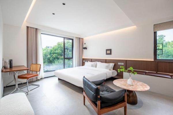 A la foto es mostra l'objecte Wuzhen Xizha yiyuqinghuan minsu situat a la ciutat de Lutou.