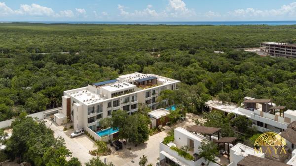 Na zdjęciu widoczny jest obiekt NHOA 206C Lux 1BR Condo Jungle View in Aldea Zama położony w mieście Tulum.